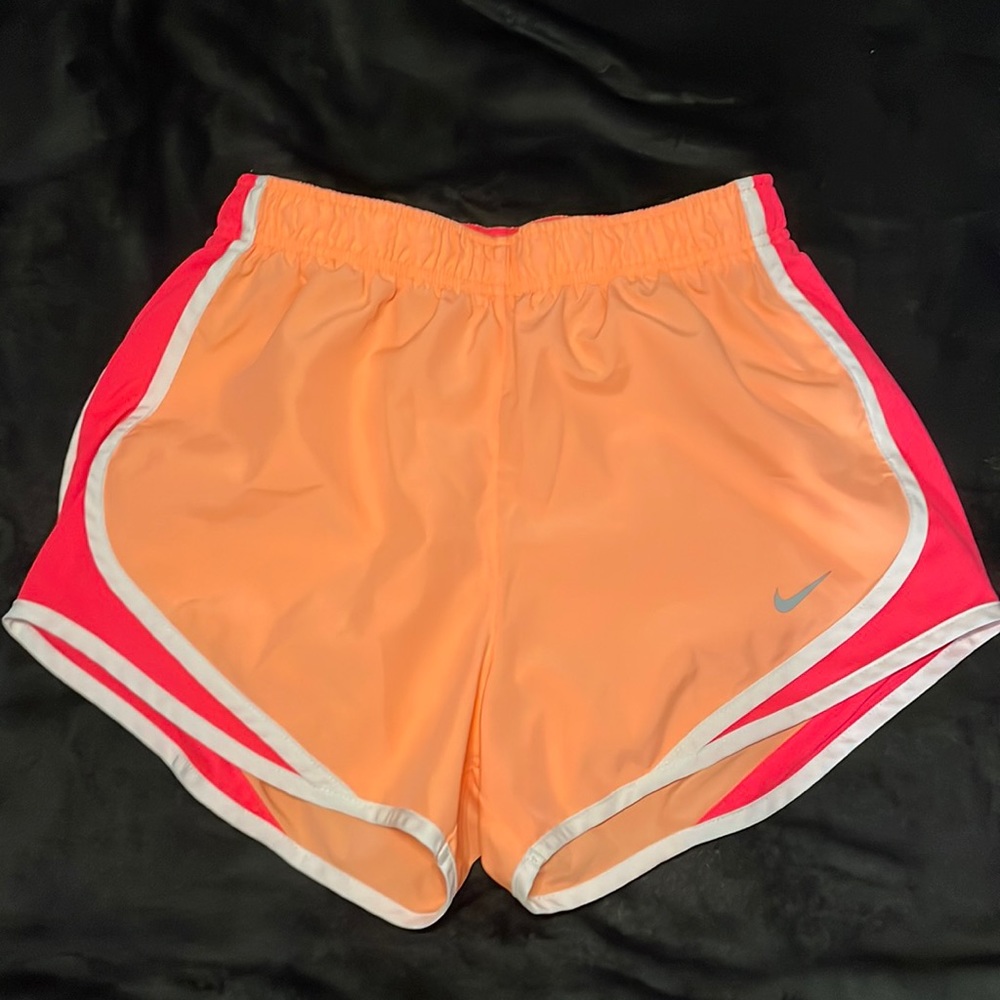 Pink and orange Nike athletic shorts